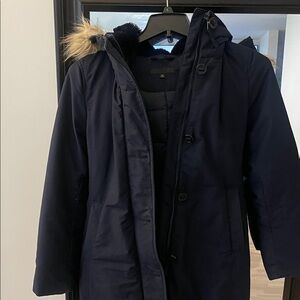 Uniqlo Navy Puffer Jacket. Zipper does not zip up &needs to be replaced
